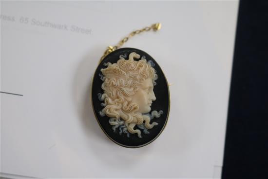 A yellow metal hardstone cameo brooch, a 10ct spinning fob, an 18ct gold and diamond ring and other items.
